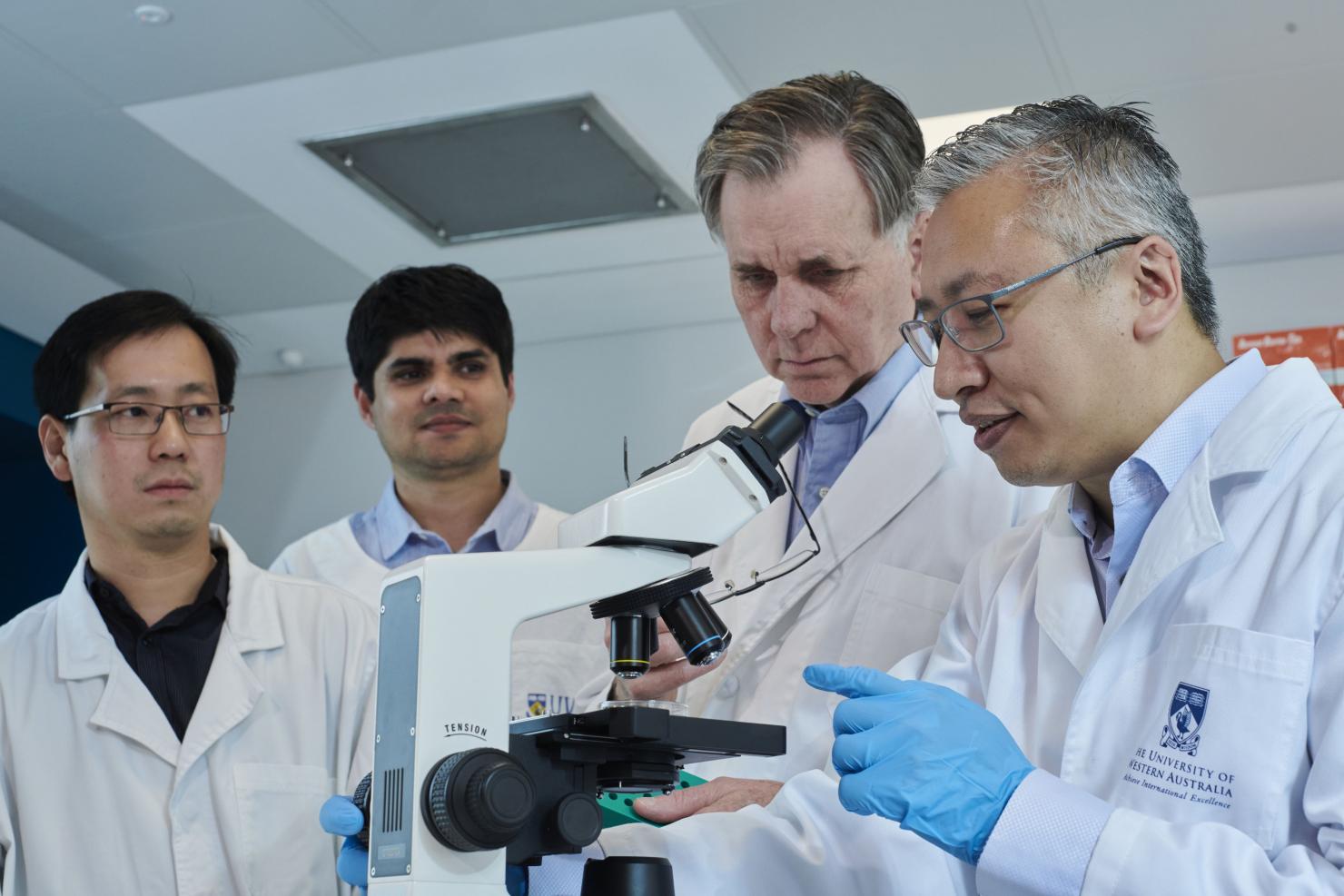 (left to right) Dr Engguan Chua, Binit Lamichhane, Prof Barry Marshall, and Dr Alfred Tay